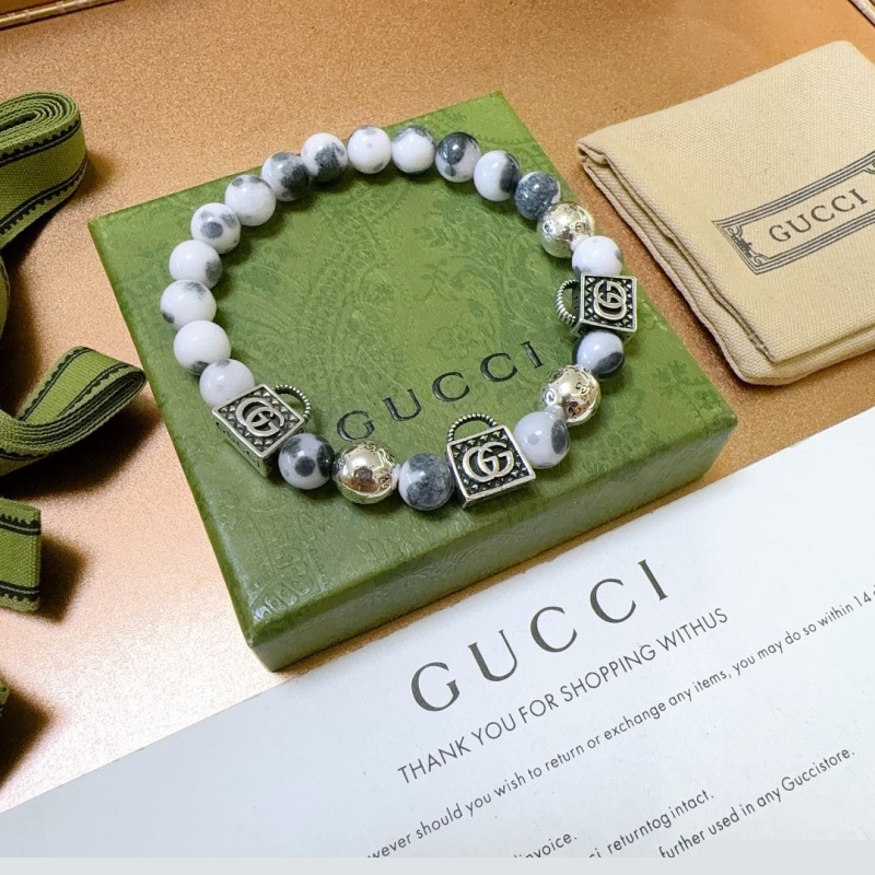 G*u*i bracelets